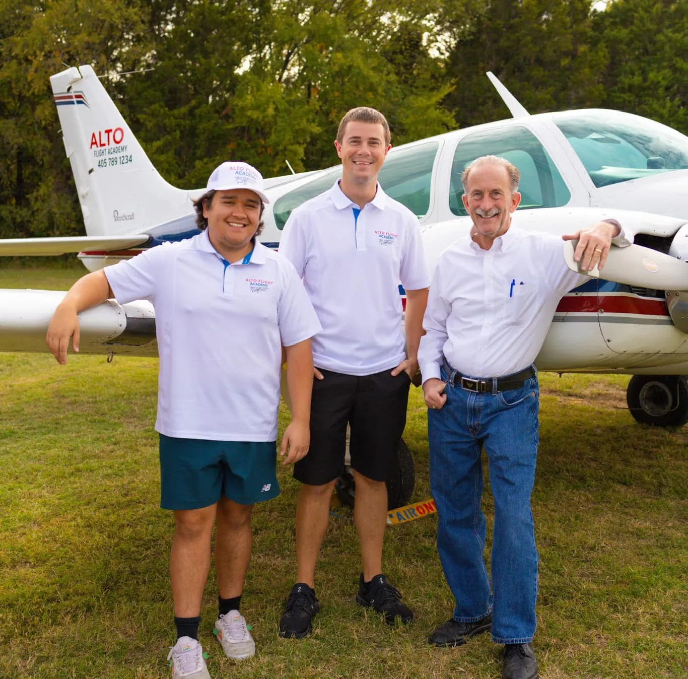 Alto Flight Academy instructors in front of a piper aircraft in Oklahoma City, OK.