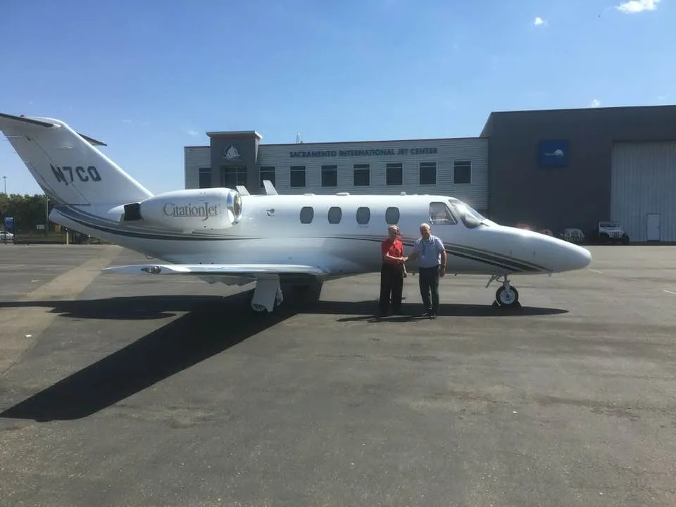 Hal Harris in front of citation jet after type rating